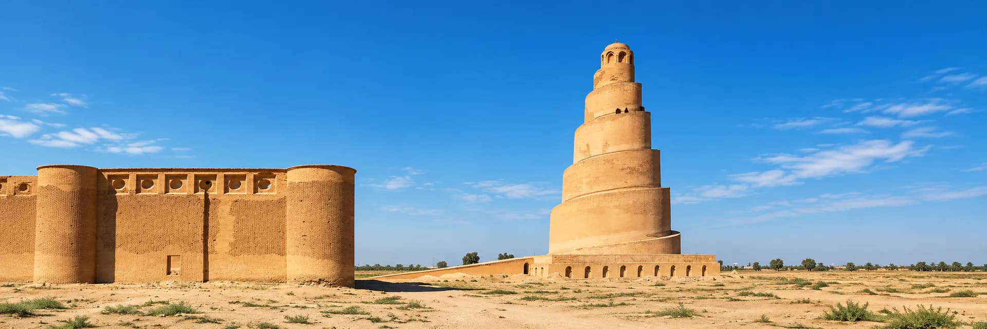 The spiral Malwiya minaret in Samarra beside the wall of the Great Mosque